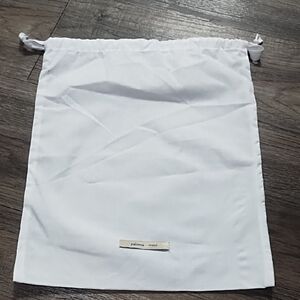 Paloma Wool Cream Label on White Fabric Dust Bag